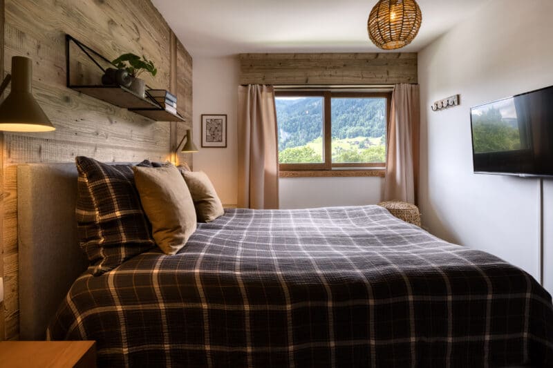 Megeve chalet soveværelse seng udsigt
